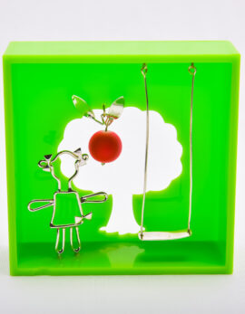 Handmade sterling silver girl in green plexiglass wall frame.