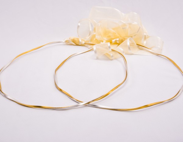 Handmade gold plated and sterling silver wedding crowns.