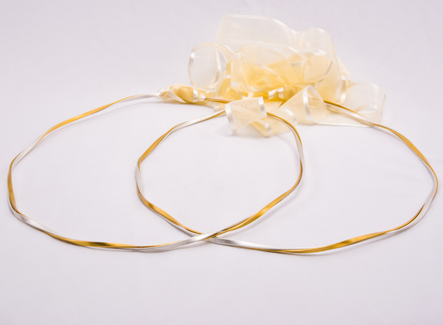 Handmade gold plated and sterling silver wedding crowns.