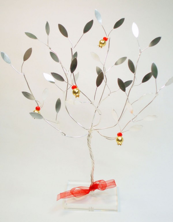 Handmade sterling silver pomegranate tree in plexiglass.
