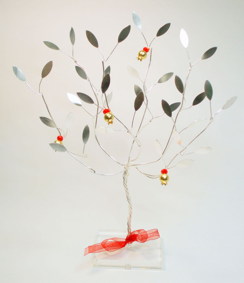 Handmade sterling silver pomegranate tree in plexiglass.