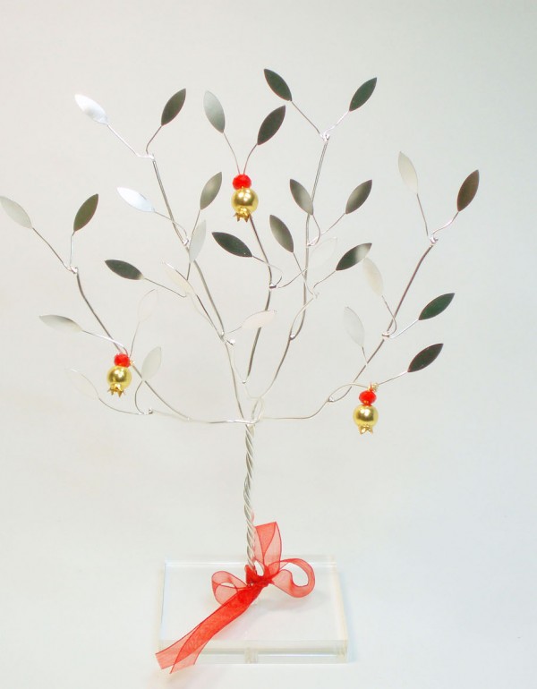 Handmade sterling silver pomegranate tree in plexiglass.